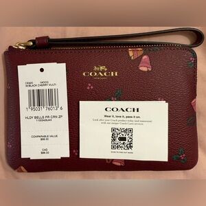 Coach holiday bells print corner zip wristlet NWT